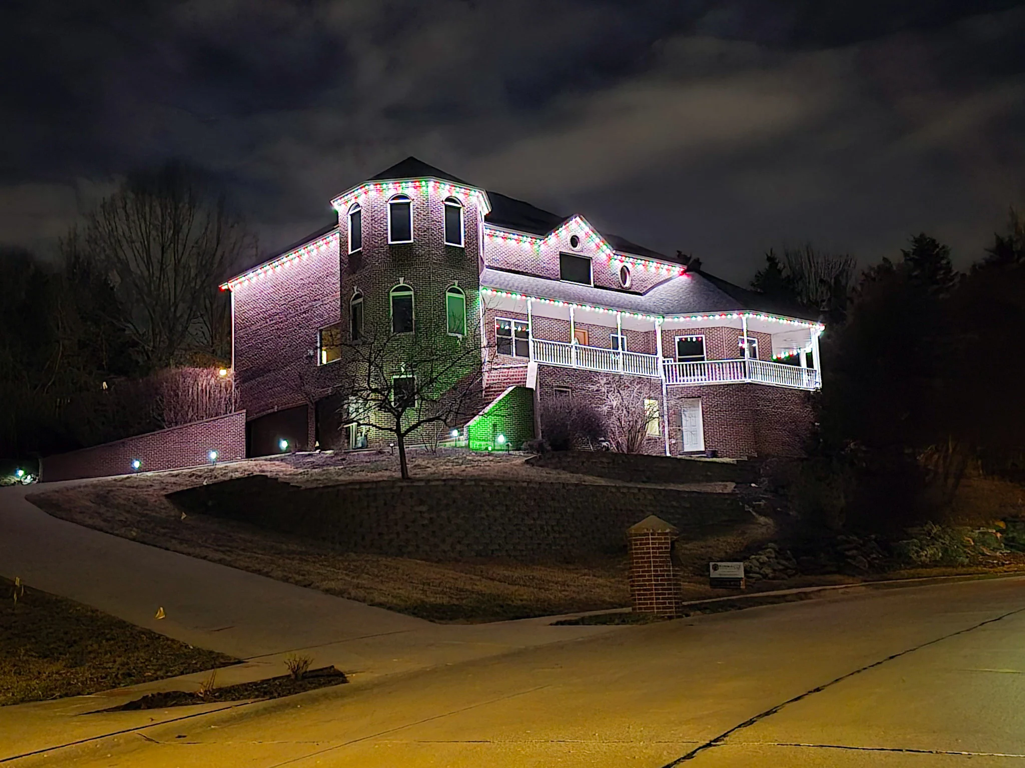 House with permanent home lighting highlighting the exterior of the house.